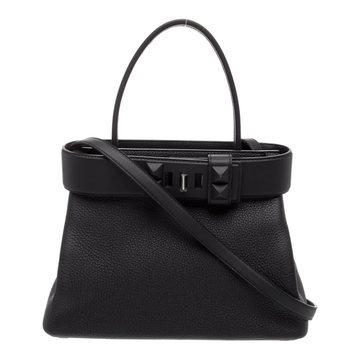 Solid Black Trapezoidal Top Handle Bag With Pyramid Stud Front Hardware, Pebbled Textured Body And Base Protective Metal Studs